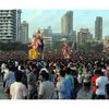 Devotees taking Ganesh idol for immersion at Girgaum Chowpatty in Mumbai. Photo: Kamlesh Pednekar