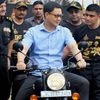 Gurugram: Union Minister for State Kiren Rijiju rides a bike during the flag off ceremony of the NSG Motorcycle Expedition-2017 at NSG campus in Gurugram on Thursday.  PTI Photo