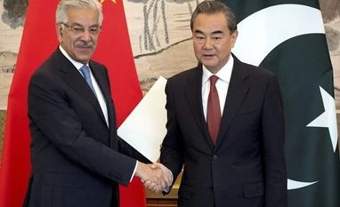 China, Pakistan take swipes at Trump's Afghan policy Khawaja Muhammad Asif, Wang Yi