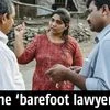 Barefoot lawyer Manisha Goswami (middle) with an official from Namati and a community member in Vapi, Gujarat