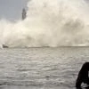 Havana : A man walks on Havana's sea wall as the ocean crashes into el Morro light house, after the passing of Hurricane Irma in Havana, Cuba, Sunday, Sept. 10, 2017.