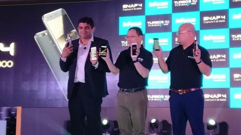 Piyush Puri, VP, InFocus and Sharp, Luo Zhongsheng, Global CEO Sharp, InFocus Mobile and Mike Wang, VP, Infocus and Sharp at the launch of Snap 4 and Turbo 5 Plus Photo: Khalid Anzar Infocus Snap 4, Infocus Turbo 5 Plus