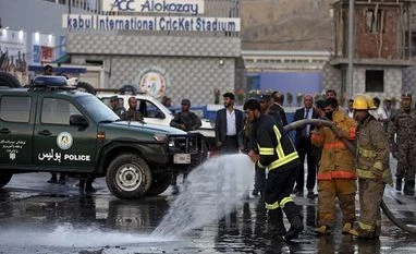 Suicide bomber kills 3 outside Kabul International Stadium Afghan firefighters work at the site of a deadly suicide attack outside a cricket stadium, in Kabul, Afghanistan. Photo: AP | PTI