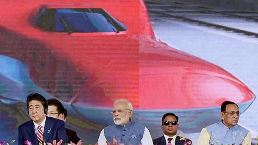 Prime Minister Narendra Modi and the Prime Minister of Japan, Shinzo Abe at Ground Breaking ceremony of Mumbai-Ahmedabad High Speed Rail Project, at Ahmedabad, Gujarat. Photo: PTI Prime Minister Narendra Modi and the Prime Minister of Japan, Shinzo Abe at Ground Breaking ceremony of Mumbai-Ahmedabad High Speed Rail Project, at Ahmedabad, Gujarat. Photo: PTI