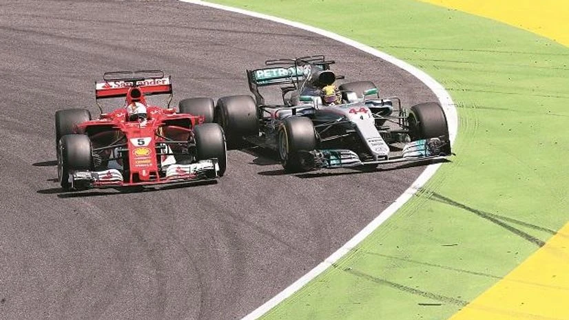 Hamilton and Vettel battling it out on the Barcelona-Catalunya racetrack. Photo: Reuters Hamilton and Vettel battling it out on the Barcelona-Catalunya racetrack. Photo: Reuters