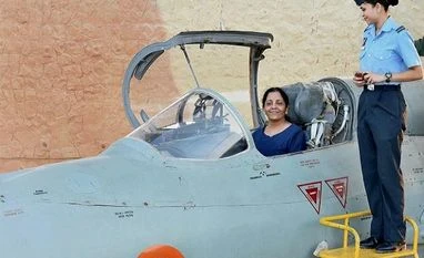Integrate the armed forces with department of defence: Former IAF head Naik Union Defence Minister Nirmala Sitharaman inside the cockpit of a MIG-21 Biscon during her visit to the Uttarlai Air Force Station in Gujarat, soon after assuming office. Photo: PTI