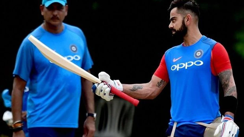Indian cricket team captain Virat Kohli and head coach Ravi Shastri during a practice session at MAC Stadium on the eve of the first ODI match against Australia, in Chennai. Photo: PTI Indian cricket team captain Virat Kohli and head coach Ravi Shastri during a practice session at MAC Stadium on the eve of the first ODI match against Australia, in Chennai. Photo: PTI
