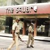 Police security at the office of Cafe Coffee Day during I-T raid. Photo: Saggere Radhakrishna