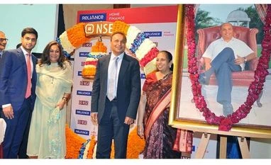Reliance Home Finance, Anil Ambani, Anmol Ambani, Tina Ambani, Anmol Ambani, ED, Reliance Capital along with Mother Tina Ambani, Anil Ambani, Chairman, ADAG and Dina Mehta at the Reliance Home Finance Listing Ceremony at NSE in Mumbai. Photo: Kamlesh Pednekar