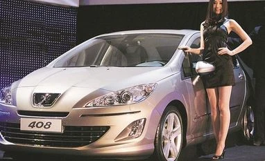 Peugeot may invest Rs 7,000 crore in Tamil Nadu plant File photo of a Peugeot 408 at its global launch in Beijing. Photo: Reuters