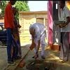 PM Modi lays foundation for toilet under Swachh Bharat Abhiyan, in Shahanshahpur. Photo: @ANINewsUP
