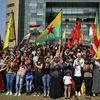 Supporters of the Kurdistan Workers' Party, known as the PKK, chant slogans as they take part in a demonstration demanding the release of Kurdish guerrilla leader Abdullah Ocalan, in front of the United Nations Headquarters in Beirut. Photo: AP/PTI