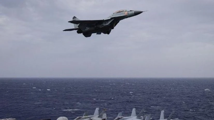 Indian Navy, ship, Malabar An Indian Navy MiG 29K on a low pass over the deck of USS Nimitz during Malabar 2017. Photo: @indiannavy