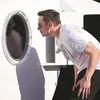 LOOKING INTO THE FUTURE: Elon Musk, founder, CEO and lead designer at SpaceX and co-founder of Tesla, checks out the SpaceX Hyperloop Pod. His concept rocketship, code-named BFR, will be able to complete a journey from New York to Shanghai in about 3