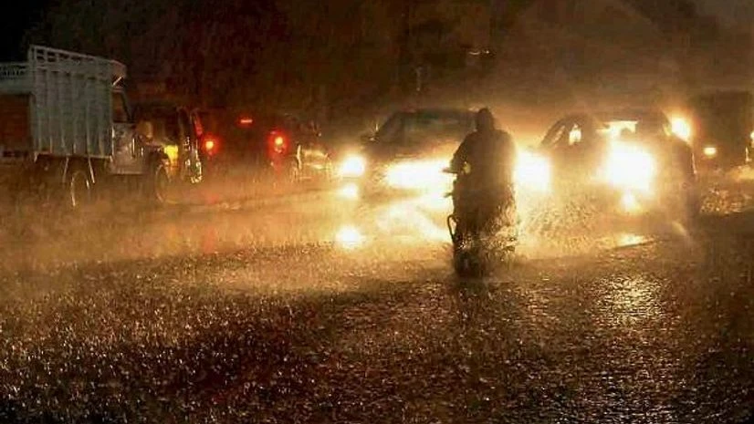Rain, rainfall, Hyderbad People commute in heavy rains in Hyderabad. Photo: PTI