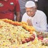 Anna Hazare pays tribute to Mahatma Gandhi at Raj Ghat in New Delhi on Monday. Photo: PTI