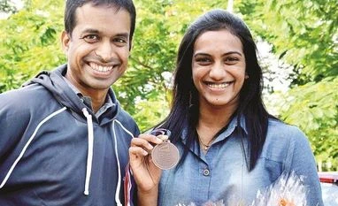 It's rare but we are contenders in each category, says coach Gopichand File photo of Pullela Gopichand and P V Sindhu | PTI