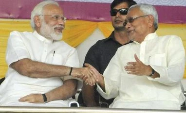 Nitish-led JD(U) to contest 4-5 seats in Gujarat Narendra Modi, Nitish Kumar