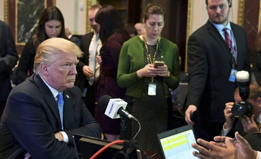 Trump's fortune slides by $600 mn on Forbes wealth list President Donald Trump sits for a radio interview in the Eisenhower Executive Office Building in the White House complex in Washington. (Photo: AP| PTI)