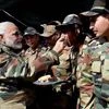 Prime Minister Narendra Modi offers sweets to jawans on the occasion of Diwali, at Gurez Valley , Jammu and Kashmir. Photo: PTI