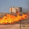 Fires flare off the gas from in Kirkuk, Iraq. Photo: AP/PTI