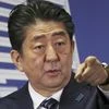 Japan's Prime Minister Shinzo Abe points to a reporter during a press conference at his Liberal Democratic Party headquarters in Tokyo. Photo: AP/PTI