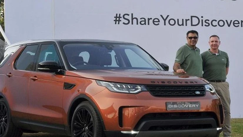 Rohit Suri, MD and president of Jaguar Land Rover India, and Mark Turner, brand director, JLR, overseas, during the launch of the new Land Rover Discovery Rohit Suri, MD and president of Jaguar Land Rover India, and Mark Turner, brand director, JLR, overseas, during the launch of the new Land Rover Discovery in Mumbai on Saturday. The fifth-generation vehicle is priced at ~71.38 lakh to ~82 lakh
