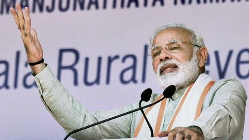 Narendra Modi Ujire : Prime Minister Narendra Modi addrerssing a public meeting for the launch of various programme at Ujire, in Karnataka on Sunday. PTI Photo