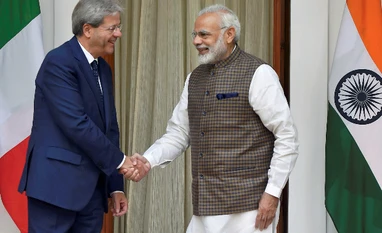 Narendra Modi holds talks with Italian PM Gentiloni; six pacts inked Prime Minister Narendra Modi shakes hands with his Italian counterpart Paolo Gentiloni prior to their luncheon talks at Hyderabad House in New Delhi. (Photo: PTI)