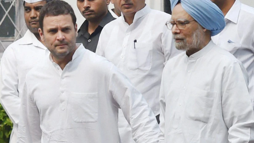 Rahul Gandhi, Manmohan Singh, Congress Congress VP Rahul Gandhi with former prime minister Manmohan Singh, Randeep Surjewala and other leaders leaves after a meeting regarding the party's November 8 protest against demonetisation, at AICC headquarters in New Delhi. (Photo: PTI)