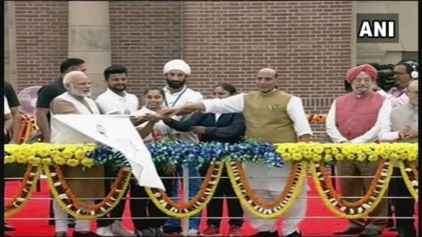 Narendra Modi, Rajnath Singh PM Narendra Modi flags off 'Run for Unity' at Major Dhyan Chand Stadium in Delhi on Sardar Patel's birth anniversary. Photo: ANI