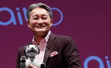 Sony CEO Hirai steps down for Chairman role; CFO Yoshida to take over Sony's President and CEO Kazuo Hirai holds entertainment robot “aibo” at a news conference in Tokyo, Japan. Photo: Reuters