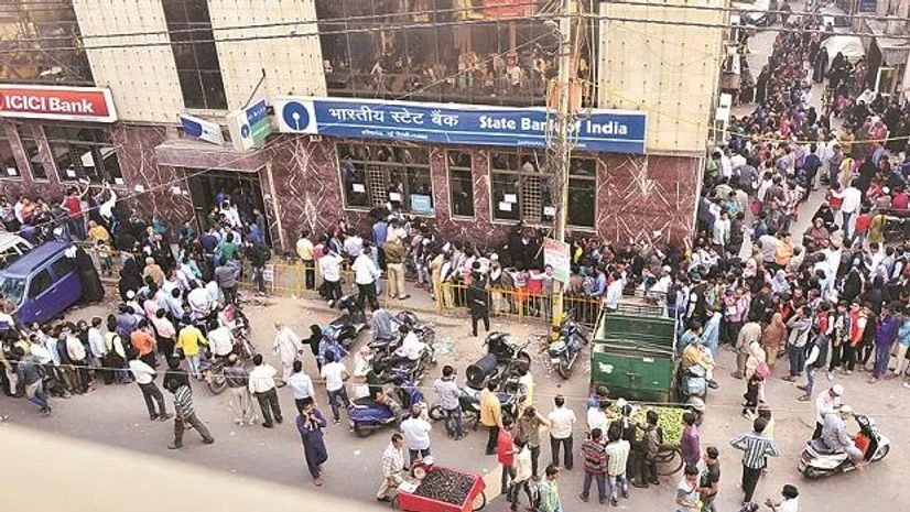 File photo of people queuing up outside ATMs after the demonetisation drive demonetisation, note ban, banks