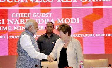 India to be high middle income economy by 2047: World Bank CEO Prime Minister Narendra Modi shakes hands World Bank CEO Kristalina Georgieva at a session on India’s Business Reforms, at the Pravasi Bhartiya Kendra in New Delhi. (Photo: PTI)