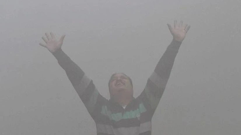 Braving the pollution Braving the pollution, a person seen doing yoga at a public park in New Delhi