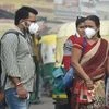 People seen wearing  pollution masks while they commute to their work places in New Delhi