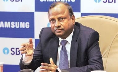 Jan Dhan Yojana enrolled 300 mn poor in banking system in 1 year: SBI Chief SBI net profit down 38% on higher provisioning