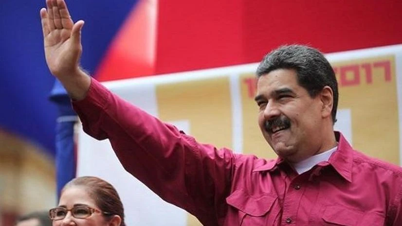 Nicolas Maduro Venezuela's President Nicolas Maduro waves as he arrives for a rally with supporters in Caracas, Venezuela. Photo: Reuters
