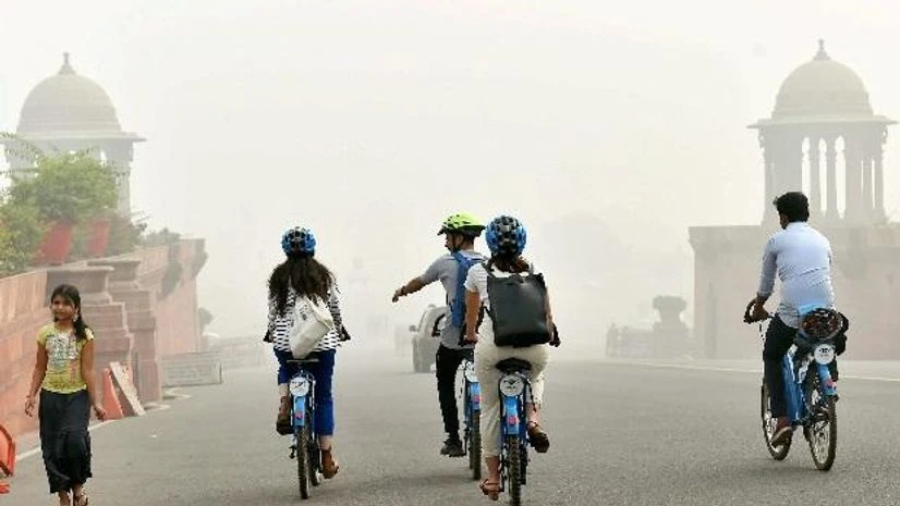 Tourists riding bicycles in Delhi on Sunday. Photo: PTI Tourists riding bicycles in Delhi on Sunday. Photo: PTI
