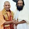 Art of Living founder Sri Sri Ravi Shankar meeting Uttar Pradesh Chief Minister Yogi Adityanath in Lucknow. Photo: PTI