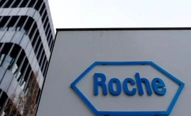 Britain's coronavirus testing system hit by Roche supply chain glitch Roche
