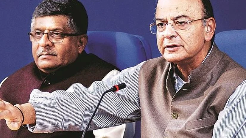 Arun Jaitley, Ravi Shankar Prasad Finance Minister Arun Jaitley (right) with Law Minister Ravi Shankar Prasad at a press meet in New Delhi. Photo: Dalip Kumar
