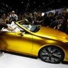 People look at a Lexus LF-C2 concept vehicle on display during the model's world debut at the Los Angeles Auto Show in Los Angeles. (Photo: PTI)