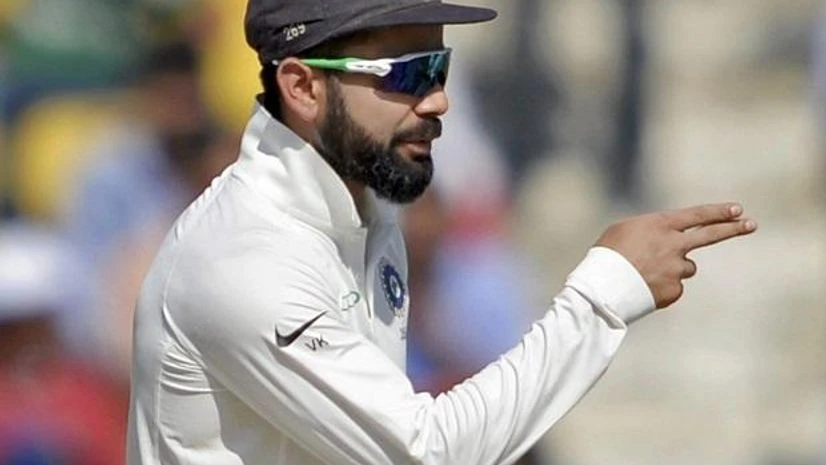 Nagpur: Indian captain Virat Kohli reacts during 4th day of the 2nd cricket test match against Sri Lanka in Nagpur on Monday. PTI Photo by Shashank Parade Nagpur: Indian captain Virat Kohli reacts during 4th day of the 2nd cricket test match against Sri Lanka in Nagpur on Monday. PTI Photo