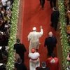 Pope Francis, center, arrives to celebrate a Mass with young people in St. Mary's Cathedral in Yangon, Myanmar, Thursday, Nov. 30, 2017. Francis is wrapping up his visit to Myanmar with a Mass for young people before heading to neighboring Bangladesh