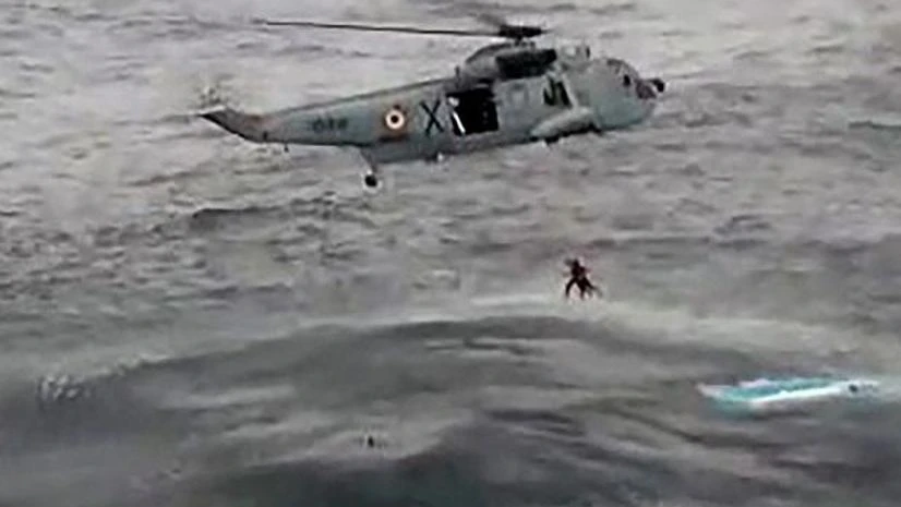 cyclone Ockhi A Navy helicopter rescues fishermen in the wake of cyclone Ockhi, in Lakshadweep on Saturday. (Photo: PTI/TV Grab)