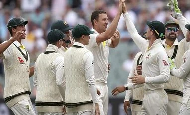 The Ashes: Wickets tumble as Australia build 268-run lead over England Australia's Josh Hazlewood, center, celebrates with teammates after taking the wicket of England's James Vince for 2 runs during the third day of their Ashes cricket test match in Adelaide