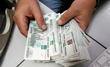 Ruble payments ruled against, Russia comes closer to default: Report Russian currency, Ruble