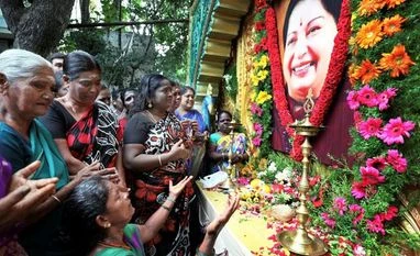 RK Nagar by-poll: Palaniswami, Panneerselvam launch campaign for AIADMK AIADMK woman members paying tribute to former chief minister J Jayalalithaa on her first death anniversary in Coimbatore. Photo: PTI