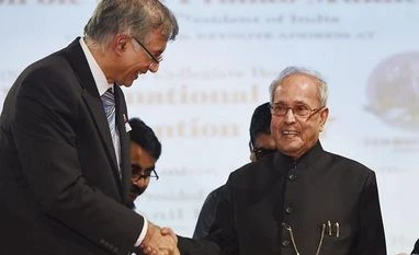 Ensure job creation with focus on rural unemployed: Pranab Mukherjee Former president Pranab Mukherjee with industrialist Niranjan Hiranandani